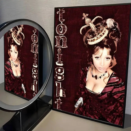A framed modern graphic poster of a woman in a dark red velvet dress with gold headpiece for living room decor