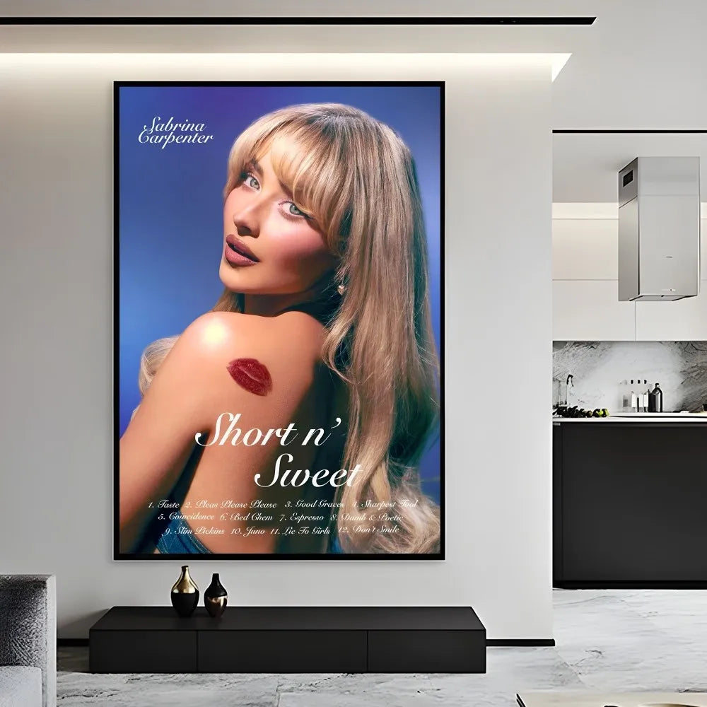 A modern graphic framed poster of singer sabrina carpenter with blonde hair and red lipstick mark on shoulder on blue background