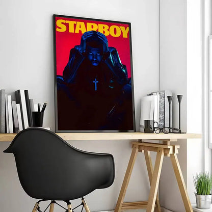 A framed starboy album cover poster with bold yellow text on red background and dark blue figure for modern living room decor