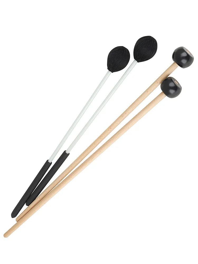 Three slade marimba drumsticks with wooden handles, black rubber tips, and white shafts for percussion instruments