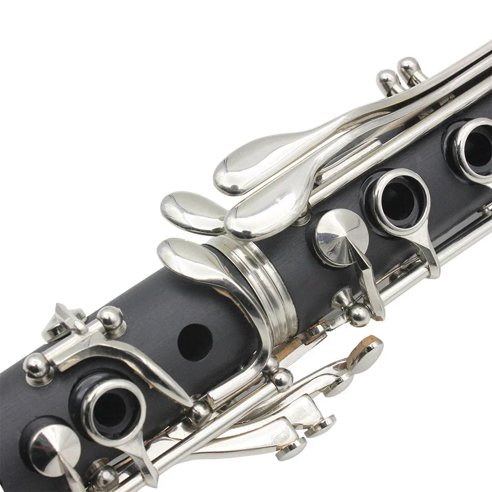Black clarinet with shiny silver keys and intricate metalwork in slade bb clarinet keys bakelite wooden design professional use
