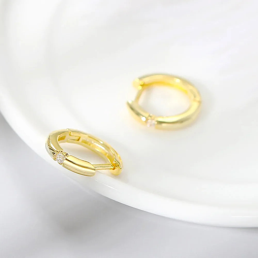 Small gold hoop earrings for women with subtle textured design and zircon diamond accent hip hop jewelry clip