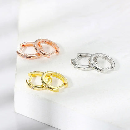 Three pairs of small hoop earrings for women in rose gold yellow gold and silver with diamond accents for hip hop jewelry