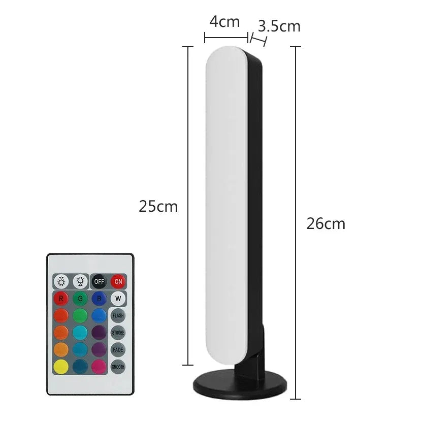 A sleek black and white smart led symphony desk lamp with sound control pickup and music rhythm ambient lighting