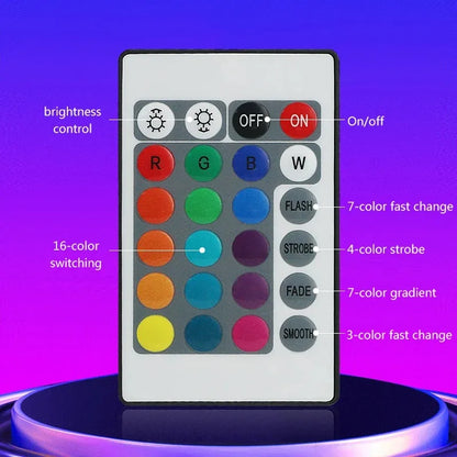 White remote control with colorful circular buttons for 16-color switching in smart led symphony sound control pickup light