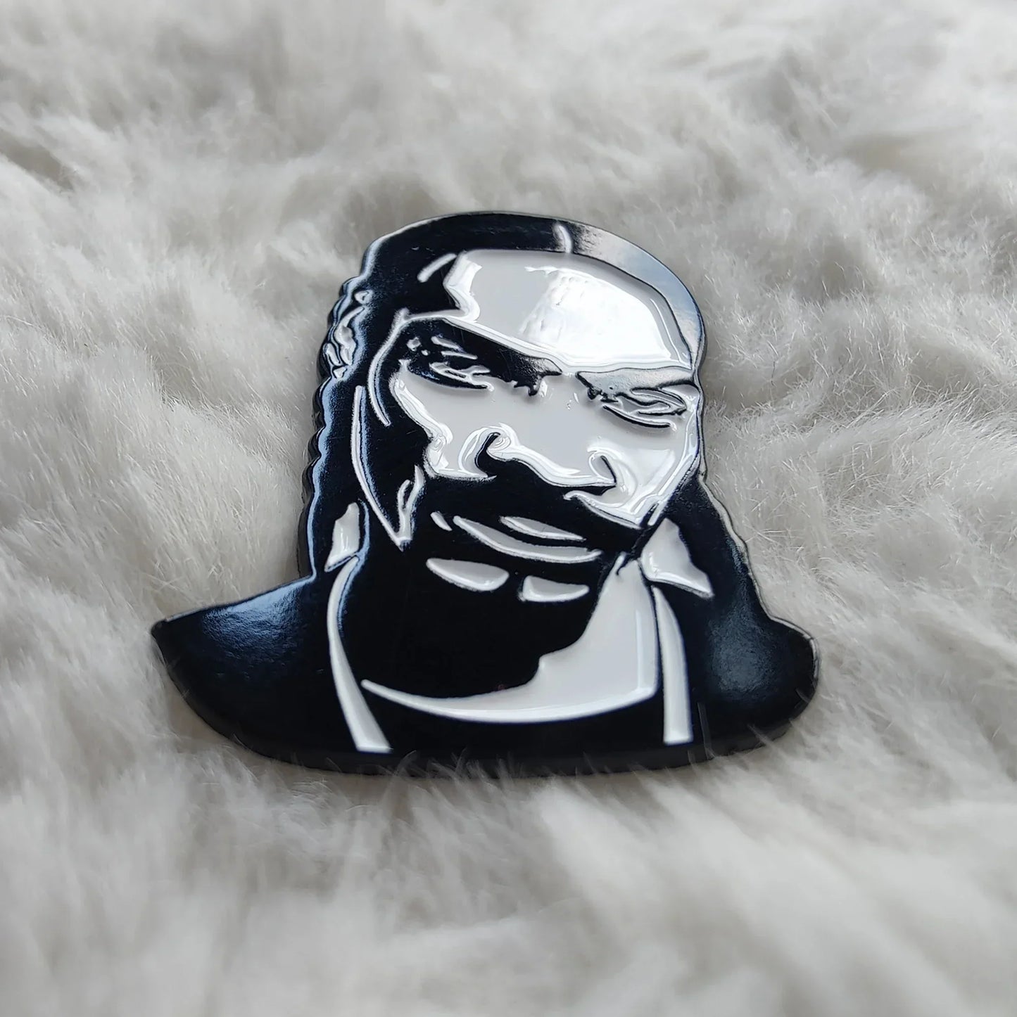 Black and silver hip hop godfather enamel pin featuring a stylized snoop dogg portrait as a rapper enamel pin badge jewelry gift