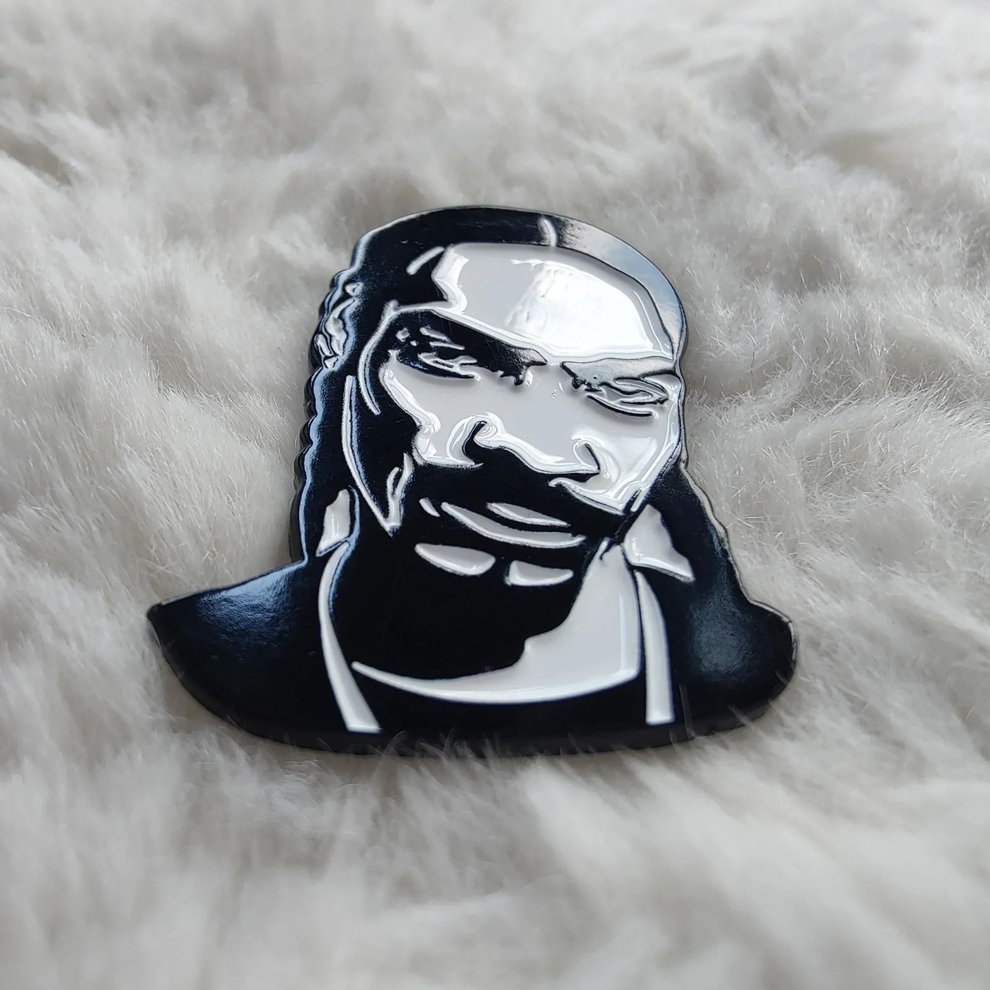 Black and silver hip hop godfather enamel pin featuring a stylized snoop dogg portrait as a rapper enamel pin badge jewelry gift