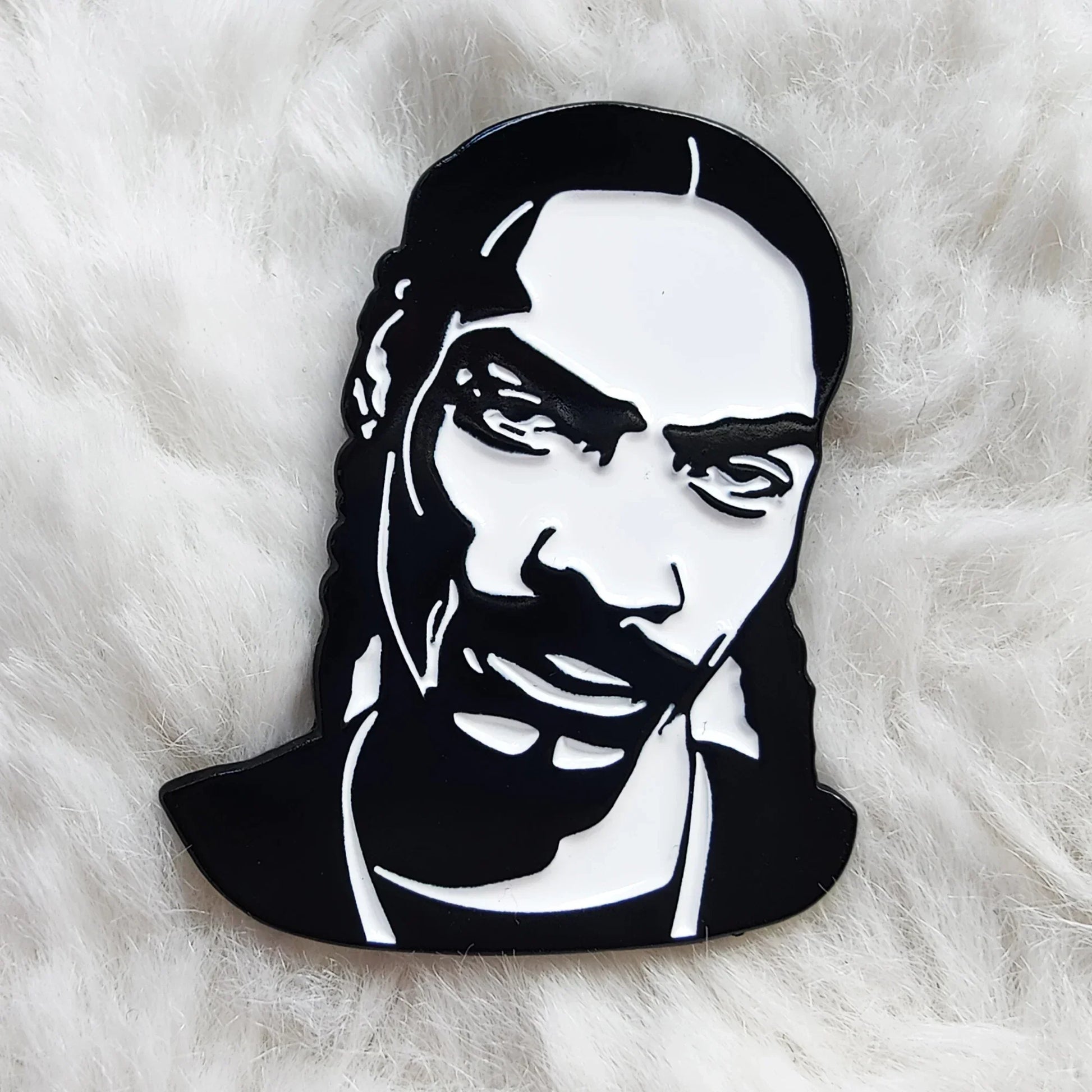 Black and white enamel pin featuring stylized snoop dogg portrait hip hop godfather rapper enamel pin badge gift