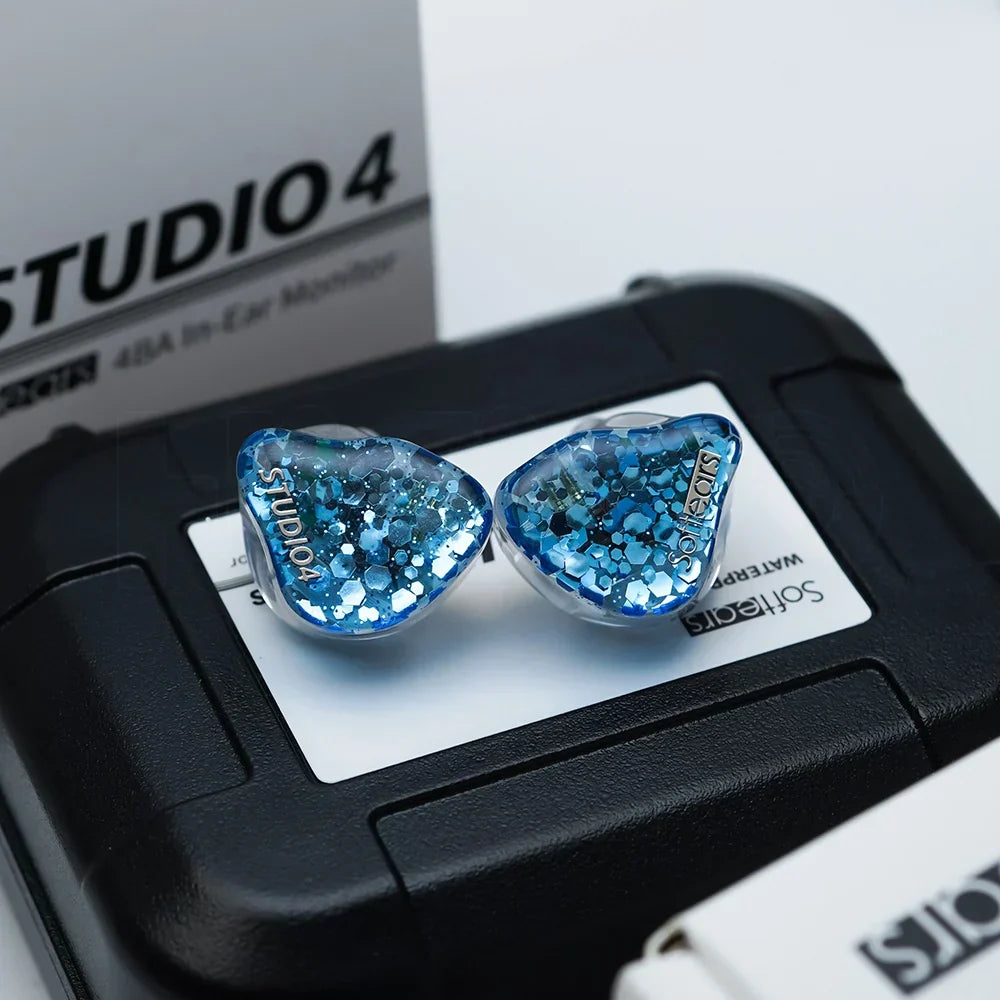 Blue glitter-filled softears studio series studio4 in-ear monitors with clear heart-shaped housings and crossover professional hifi design