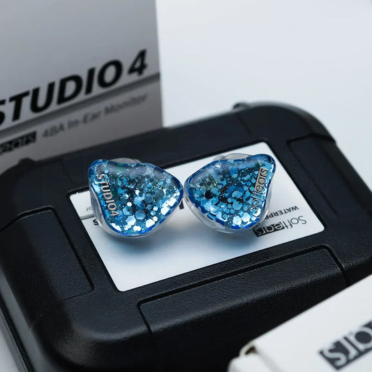Blue glitter-filled softears studio series studio4 in-ear monitors with clear heart-shaped housings and crossover professional hifi design