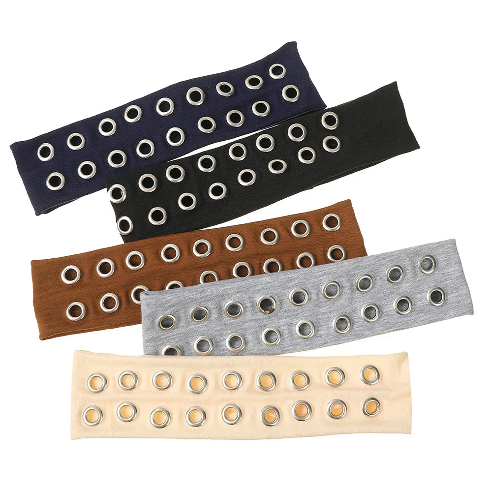 Five solid color punk elasticated women wide headbands in navy black brown gray and beige with silver metal grommets