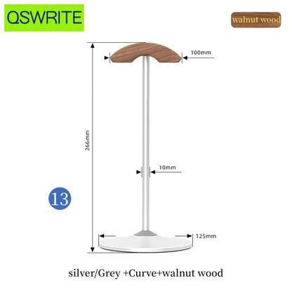 A sleek silver and grey metal headphone holder with a curved walnut and beech wood top for game headphone storage