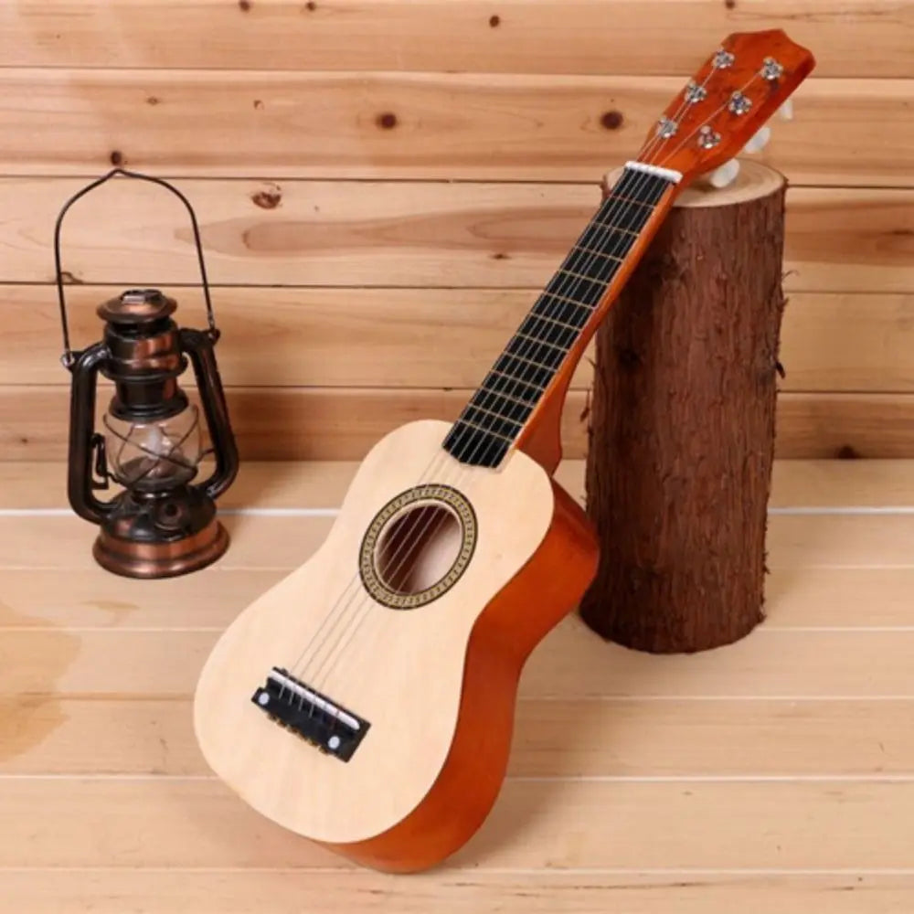 A small light brown solid wood classical guitar with adjustable string knob and durable high sound quality design