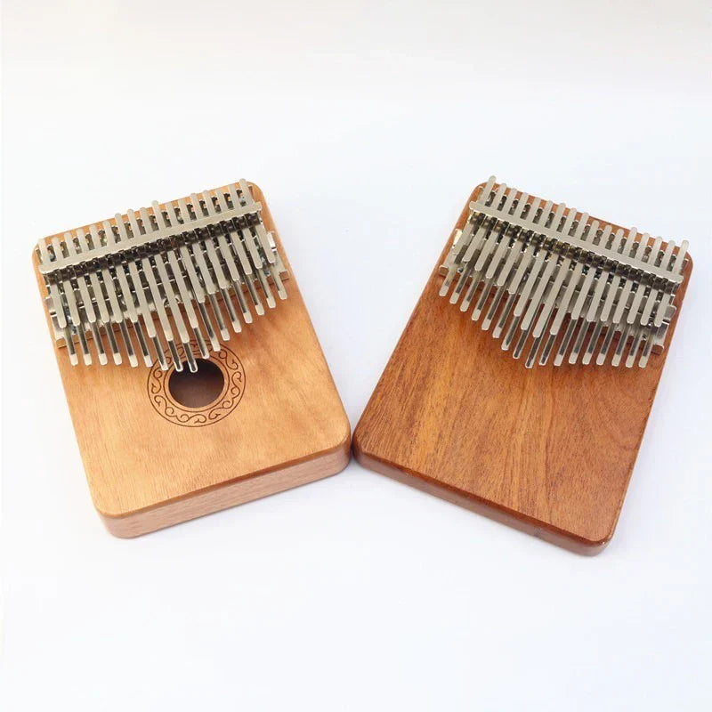 Two solid wood kalimbas with 34 silver tines featuring a children mahogany keyboard thumb piano adults use