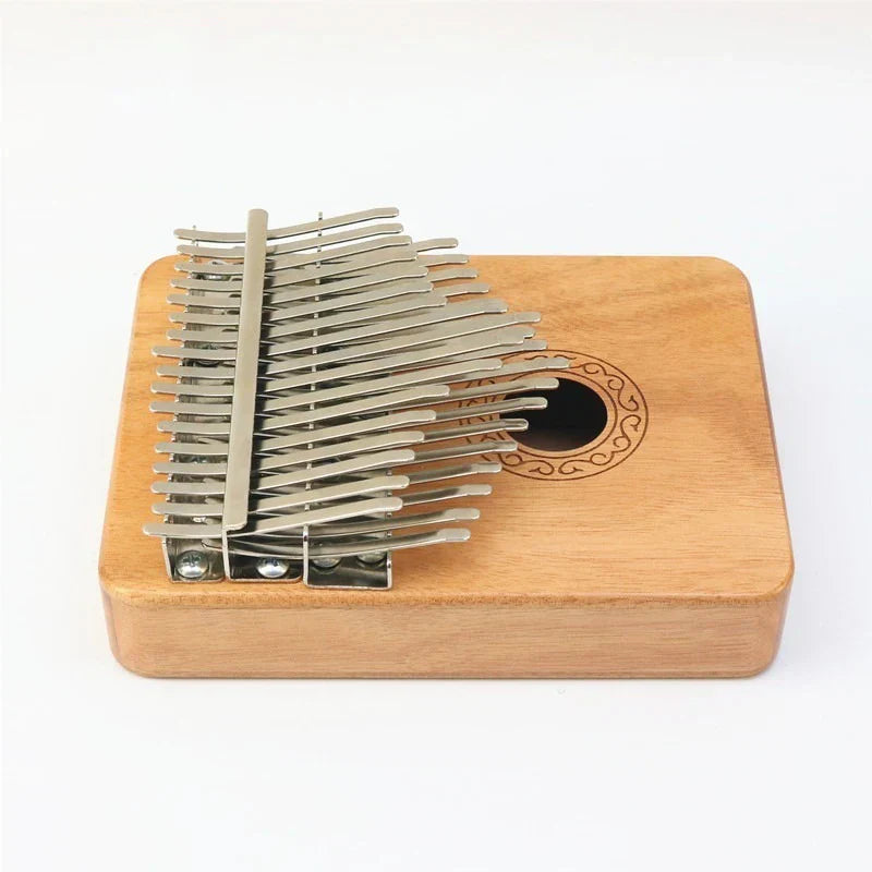 Solid wood kalimba with silver metal tines and circular inlaid sound hole design for thumb piano adults and children mahogany keyboard