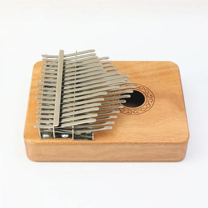 Solid wood kalimba with silver metal tines and circular inlaid sound hole design for thumb piano adults and children mahogany keyboard