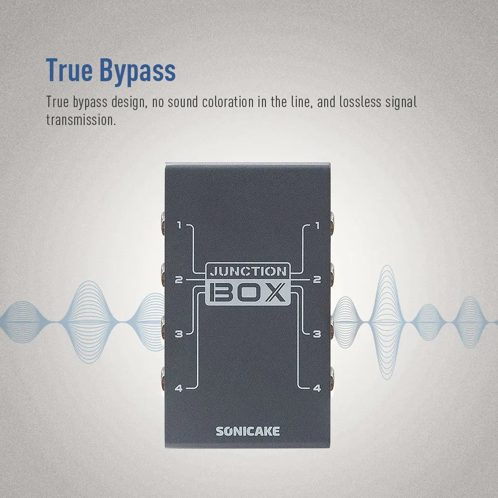 Black rectangular sonicake junction box audio signal splitter with silver lettering for guitar bass pedal music instruments