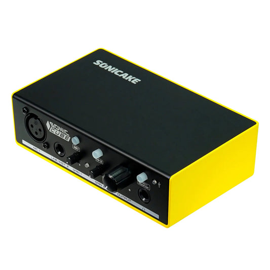 Black and yellow sonicake sonic cube audio interface with quality analog preamplifier for studio recording microphone