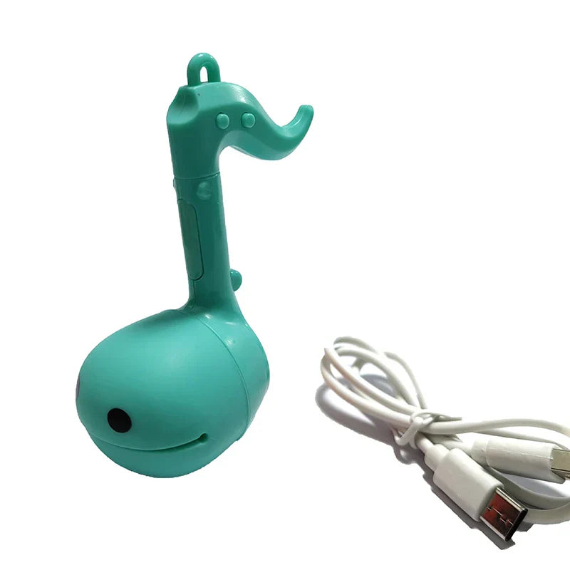 Teal plastic musical notes otamatone mini electronic usb flash drive with smiling face and button details for creative use