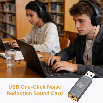 Gray and orange usb noise reduction converter sound card with circular dial for studio podcast game live streaming use