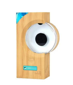 Bamboo speaker with circular transparent front and teal accents featuring magnetic fluid and equipment motion sensor for music sound touch