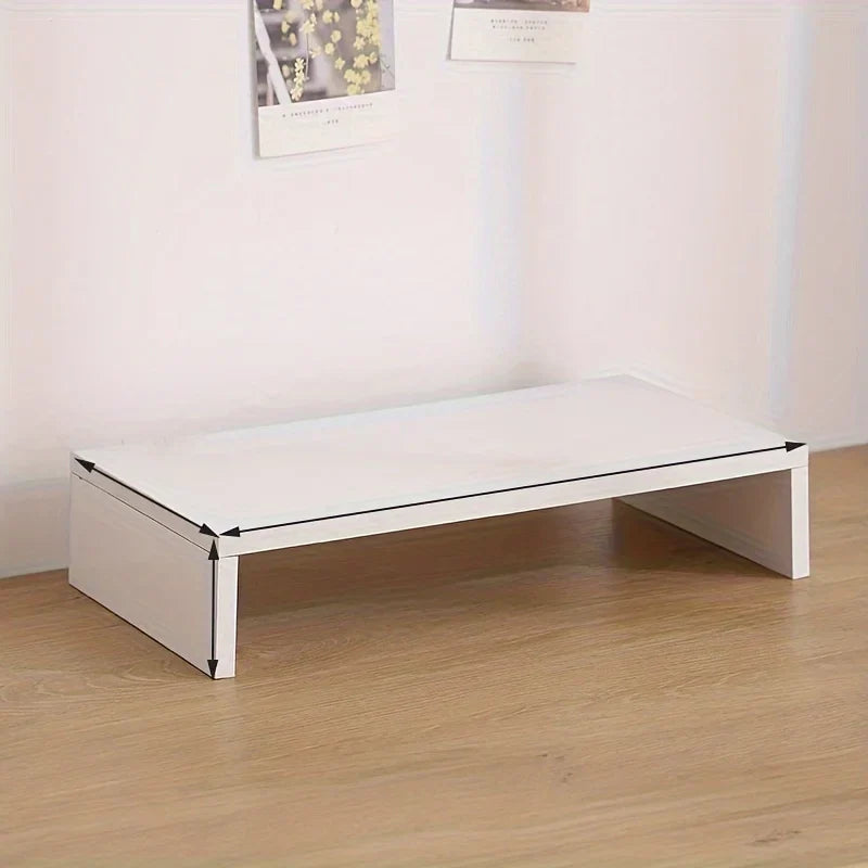 White minimalist desk featuring a spacious wooden monitor stand with elevating computer riser and storage organizer