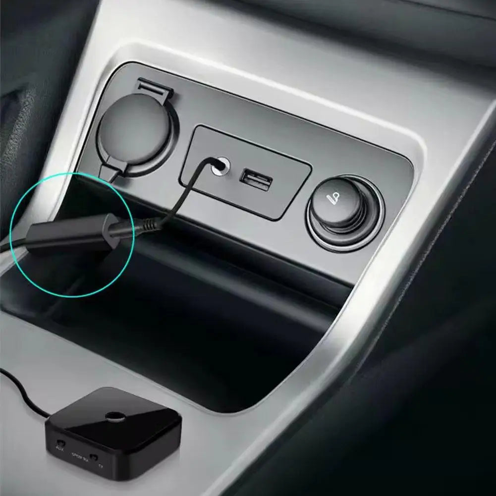 Black rectangular bluetooth speaker adapter with matte finish and ports connected to usb port noise filter ground loop noise isolator for car stereo audio