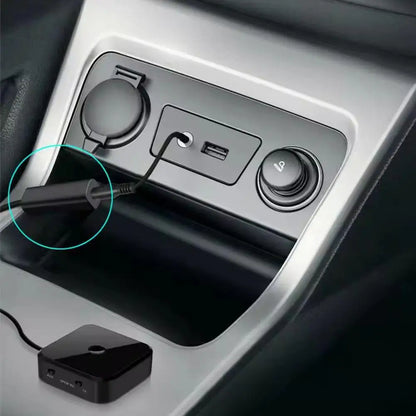 Black rectangular bluetooth speaker adapter with matte finish and ports connected to usb port noise filter ground loop noise isolator for car stereo audio