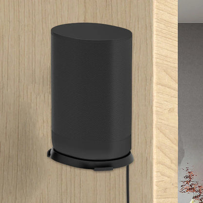 Black cylindrical speaker on a wall stand holder shelf made of aluminum alloy for space saving and mounting use