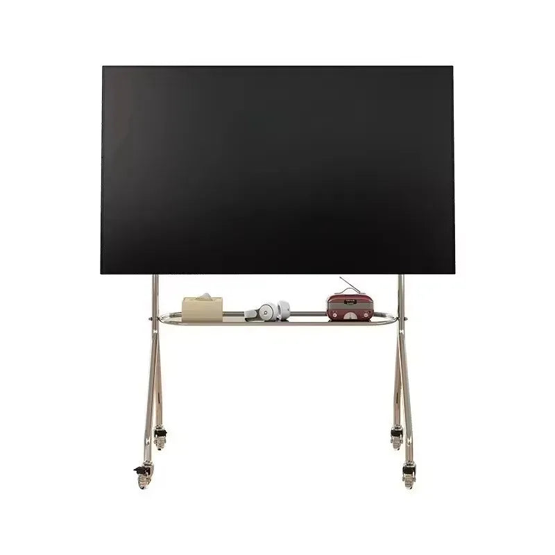 Black flat-screen television mounted on a stainless steel tv stand with storage shelf lockable wheels for living room use