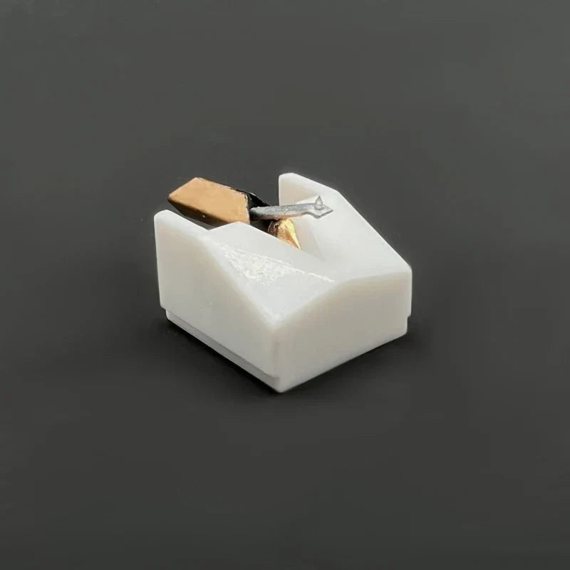 White plastic Stanton phono head replacement needle with gold and silver assembly for essential DJ turntable use