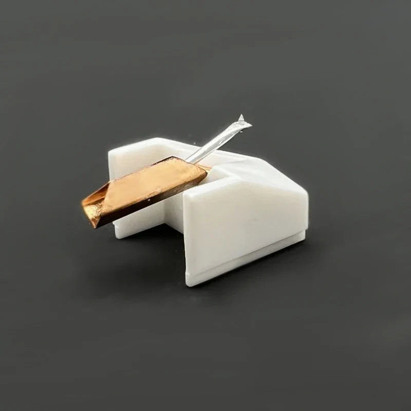White plastic stanton phono head replacement needle with gold stylus and silver needle for essential dj turntable use