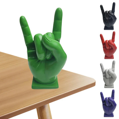 Vibrant green resin hand gesture statue with glossy finish and square base serving as a drum stick holder display stand