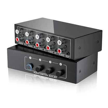 Black stereo audio switch box with red and white rca jacks and four knobs for 4-in-1 input audio output selection