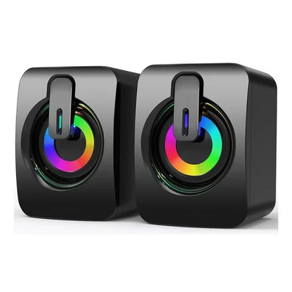 Black cube-shaped stereo speakers with colorful rgb lighting for desktop computer laptop mini home musical use