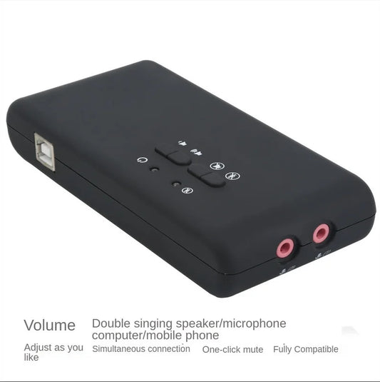 Black usb audio interface with pink 3.5mm jacks and buttons for volume mute mic speaker switching for channel recording playback and dynamic audio optical features