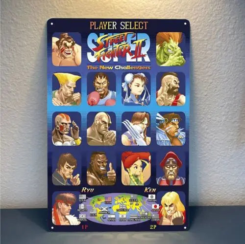 Blue metal Street Fighter 2 tin sign featuring player select screen with colorful portraits and pre-drilled holes for hanging