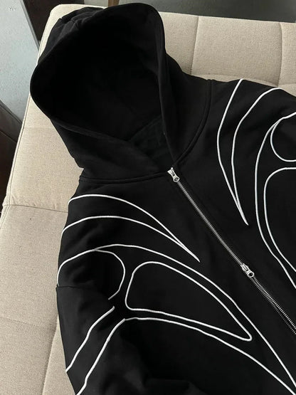 Black embroidered double zipper hoodie with bold white leaf patterns in street retro fashion punk oversized sweatshirt style