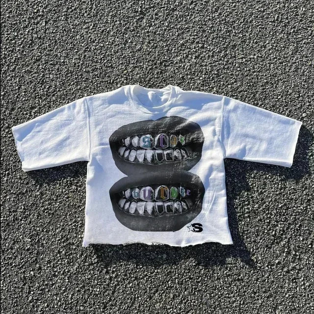 White cotton short-sleeve streetwear boy scout t shirt y2k clothing with bold black teeth graphic and colorful grillz.webp