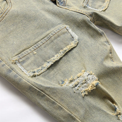 Distressed light-wash denim spliced slim jeans with hip hop holes and frayed details in streetwear retro style for men