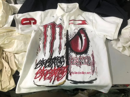 White short-sleeved polo streetwear shirt y2k with bold red black monster energy logo and venom graphic for hip hop fashion