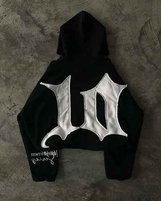 Back view of a black streetwear vintage grey hoodie y2k with a bold white gothic w embroidered for womens hip hop style