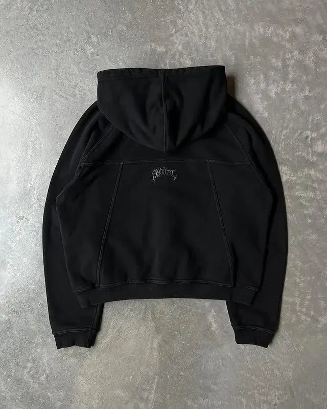 Back side of black streetwear zip hoodie y2k with subtle embroidered logo and graphic print oversized design