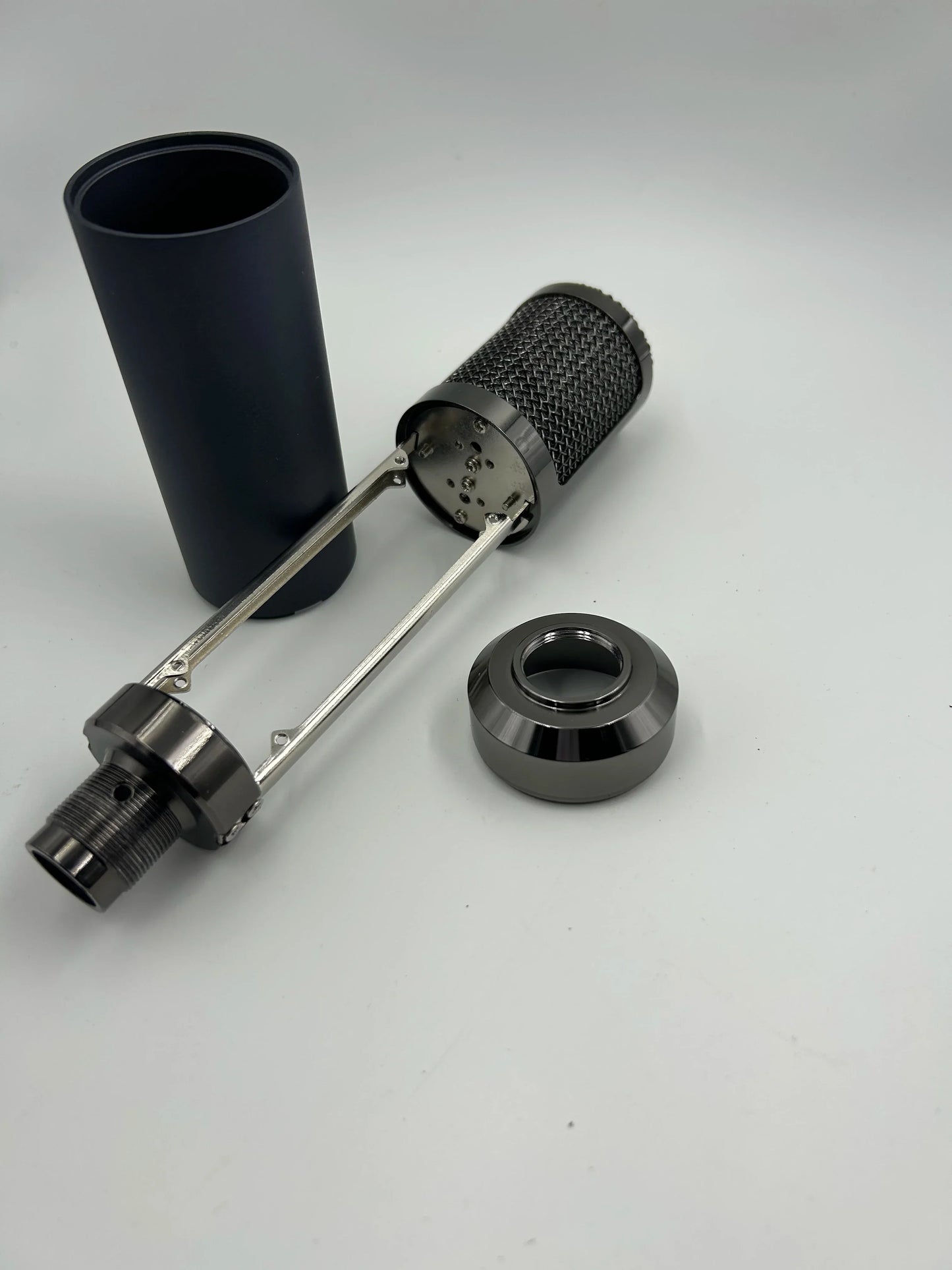 Black cylindrical studio microphone shell with mesh grille and metallic accents for diy microphone parts type beat music