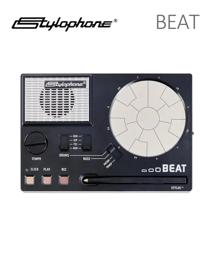 Black stylophone beat electronic drum machine with circular white pad silver grille and labeled control knobs for rhythm loops