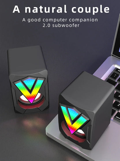 Black cube-shaped subwoofer stereo surround rgb gaming speakers with vibrant rainbow led v-shape for desktop pc loudspeakers