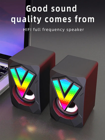 A pair of black and red subwoofer stereo surround rgb gaming speakers with rainbow led v-shape for desktop pc loudspeakers