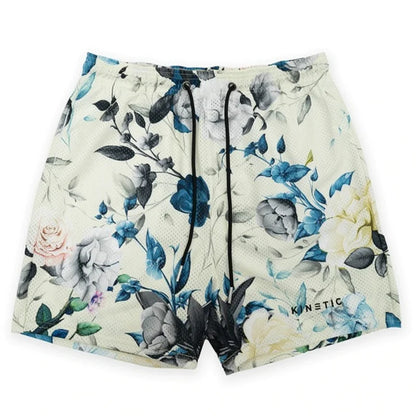 Beige short pant rose with delicate blue gray and pink floral embroidery featuring black drawstrings in fitness polyester fast dry fabric