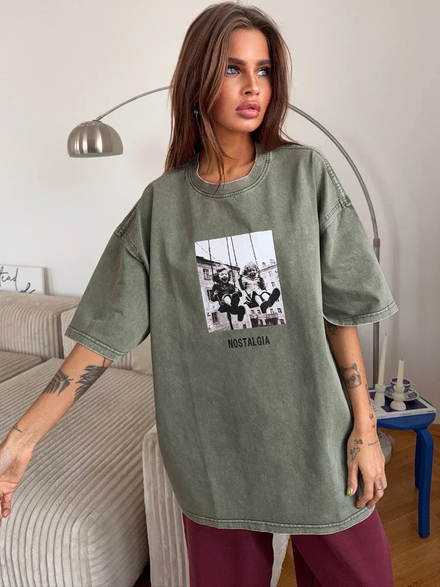 Olive green oversized cotton t-shirt with black and white retro printed graphic and wax printing for fashion hip hop style