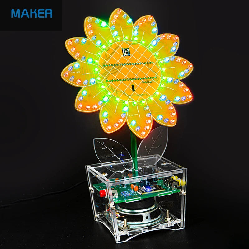 A glowing yellow and green led sunflower bluetooth sound kit with animation mode and a transparent acrylic base housing electronic parts